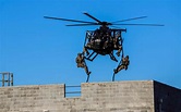 Photo : mh-6m little bird helicopter deploying Army Rangers
