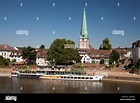 Townscape with Weser river shore and Luther Church, Holzminden, Weser ...