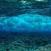 Photo by Brian Skerry @brianskerry | Underwater view of a wave breaking ...
