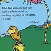 the lorax is sitting on top of a tree stump and looking up at it