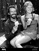 BARQUERO, from left: Warren Oates visiting with his wife, Vickery ...