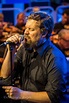 John Grant performing with the BBC Philharmonic at Media City, Salford