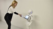 Instead of asking, "are robots becoming more human?" we need to ask ...