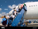 Passengers Boarding Airplane High Resolution Stock Photography and ...