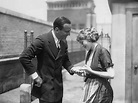 Newlywed actor Douglas Fairbanks having his palm read by his wife ...