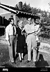 Glenn Miller holds son Steve as brother Dean and mother Mattie Lou look ...