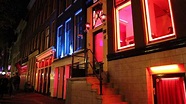 Amsterdam: 1,5-stündiger Abend-Rundgang im Rotlichtviertel | GetYourGuide