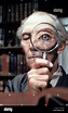 PETER CUSHING WITH MAGNIFYING GLASS TOP SECRET! (1984 Stock Photo ...