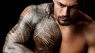 Superstar Ink: photos | WWE.com Tatuaje Roman Reigns, Roman Reigns ...