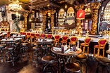 Step Up to New York’s Longest Bar and Back in Time at Oscar Wilde ...