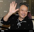 Taiwanese film director Ang Lee waves after arriving at Taiwan Taoyuan ...