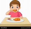 Cartoon little boy eating fried chicken Royalty Free Vector