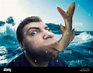 Man eating fish Stock Photo - Alamy