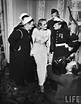 Actress Marlene Dietrich surrounded by two sailors, a soldier & a ...