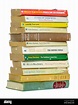 Stack of old paperback books by author Helen MacInnes, on a white ...