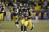Safety Chris Hope of the Pittsburgh Steelers runs with the ball after ...