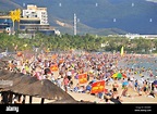 Tourists crowd a beach resort during the Chinese Lunar New Year holiday ...