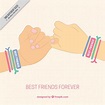 Fondo de símbolo de amistad con manos y pulseras de colores | Vector Gratis