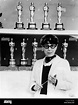 EDITH HEAD, surrounded by the eight Oscars she has won during a ...