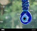 Eye-shaped Arabic Nazar symbol hanging on the air Stock Photo - Alamy