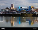 The seafront at New Brighton, Wallasey, UK with buildings reflected in ...