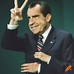 Surreal artwork depicting richard nixon with horns making peace sign on ...