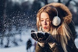 Woman Blowing Snow from Hand · Free Stock Photo