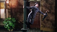 In Singin' In The Rain (1952), during Gene Kelly's iconic titular ...