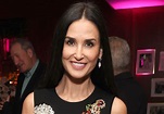 Demi Moore Pairs Navy Gown With Feather Jacket in Ageless Photo ...