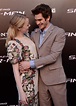 Emma Stone looked lovingly at her boyfriend, Andrew Garfield, as he ...