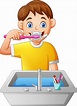 Cartoon boy brushing teeth | Premium Vector