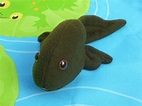 This tadpole puppet is starting to change into a frog. Hop over to http ...