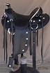 This stiking saddle features rich drum dyed black leather with an ...