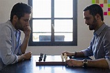 Two men playing chess stock photo