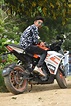 Boy posing on KTM bike - PixaHive