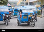 Tres ruedas, moto-taxis en la ciudad de General Santos en Mindanao ...