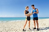Personal Trainer at the Beach Stock Image - Image of athlete, cross ...