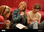 Group of teenagers praying Stock Photo - Alamy