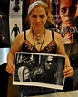 Rochelle Davis holding a picture of herself and Brandon Lee - The Crow ...