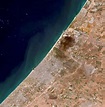 Satellite photos show leveled buildings and plumes of smoke in Gaza ...
