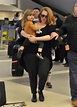 Singer-Adele-and-her-son-Angelo-Konecki-arriving-on-a-flight-at-LAX-536x750