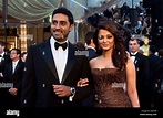 Indian actress Aishwarya Rai Bachchan (R) and her husband Abhishek ...