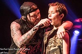 Saliva frontman Bobby Amaru with young fan on stage - Click Click Boom ...