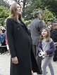 Pregnant Carla Bruni catches the eyes of young girl on a public ...