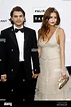 Actor Emile Hirsch and his girlfriend Brianna Domont attend the amfAR ...