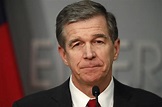 Gov. Roy Cooper signs executive order further restricting ‘essential ...