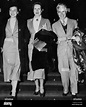 Paulette Goddard, her mother Mrs. Alta Goddard, Charlie Chaplin leaving ...
