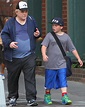 Philip Seymour Hoffman is drenched in sweat as he picks his mini-me son ...