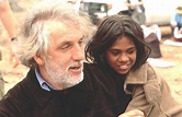 Australian film director Phillip Noyce with one of the girls from the ...
