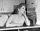 Carol Grace Matthau poses in her kitchen. 1956 Photograph by Anthony ...